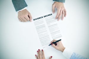 An uncontested divorce being signed by a client in Jacksonville, FL.